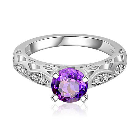 Amethyst Roman Edge Ring - Amethyst Roman Edge Ring featuring a central purple cubic zirconia surrounded by clear gemstones on an ornate, rhodium-plated brass band.
