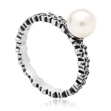 Side view of the sterling silver pearl ring, showcasing its lustrous finish.