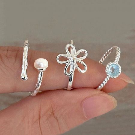 Sterling Silver Fresh Sweet Bloom Series Open Ring Set of 5 - A collection of four unique 925 sterling silver open rings from the Fresh Sweet Bloom series, featuring twisted band, pearl, flower, and blue gemstone designs.