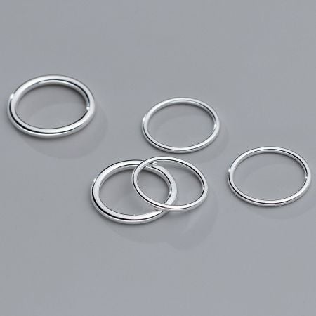 925 Sterling Silver Simple Plain Stack Rings (Set of 5) - A set of five 925 sterling silver plain stackable rings with a sleek, modern design, shown against a neutral background.