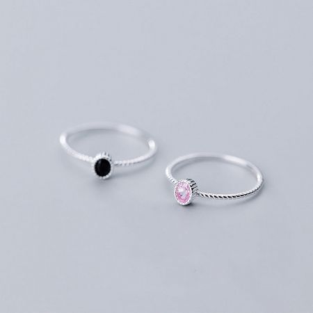 925 Silver Single Cubic Zirconia Stone Ring Set of 5 - A set of two 925 sterling silver rings, one with a single black cubic zirconia stone and the other with a pink one, displayed on a white background.
