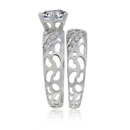 The complete Timeless Ring Set, showing both the main engagement-style ring and the matching band together.