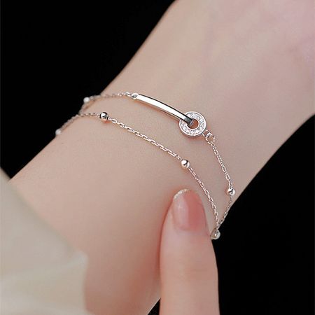 Unique 925 sterling silver bracelet featuring a stylish safety pin design element.