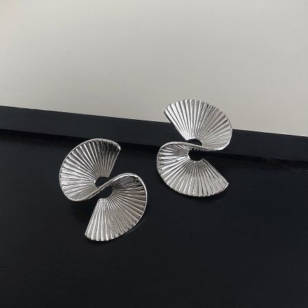 Product shot of the minimalist irregular geometric earrings in a sleek silver finish.