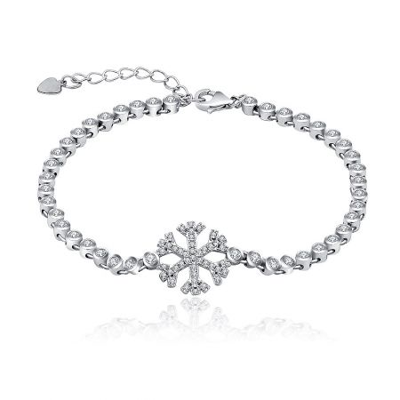A close-up view of the snowflake charm, highlighting the sparkling cubic zirconia stones and the heart-shaped clasp detail.