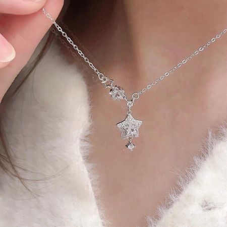 Detailed view of the 999 sterling silver star pendant.