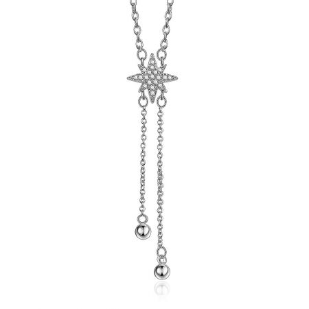 Close-up view of the star pave ball pendant on the elegant dangle necklace, showing the intricate stone setting.