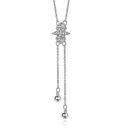 Detailed shot of the rhodium-plated star pendant with clear stones and dangling silver ball accents.