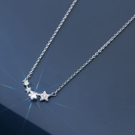 925 Sterling Silver Star Pendant Necklace Set of 5 Gifts for Sister or Her - A detailed close-up of the 925 Sterling Silver Star Pendant Necklace, showcasing the sparkling cubic zirconia stones set in the star-shaped design. Perfect hypoallergenic gift for sisters.