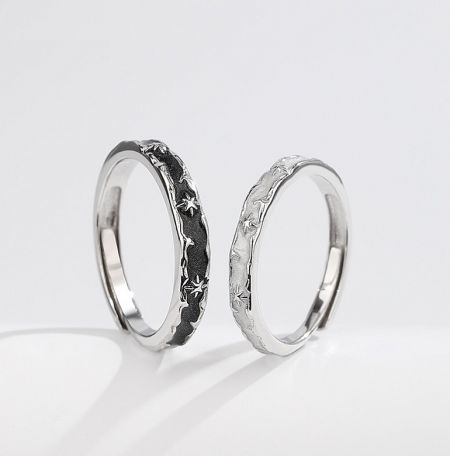 925 Sterling Silver Couple Rings - A pair of 925 sterling silver couple rings featuring an elegant star pattern, perfect for wholesale and custom jewelry collections by JR Fashion Accessories.