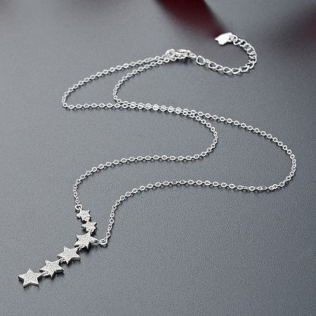 925 Sterling Silver Six Shining Stars Tassel Necklace Set of 5 - A close-up of the 925 sterling silver six shining stars tassel necklace, showcasing the detailed star pendants on a delicate chain.