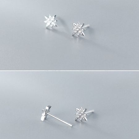 Detailed view of the 925 sterling silver starburst stud earrings.