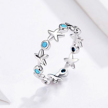 925 Sterling Silver Ocean Blue Zircon Starfish Band Ring Set of 5 - A set of five 925 sterling silver rings with an ocean-inspired starfish design, adorned with sparkling ocean-blue zircon stones, displayed on a neutral background.