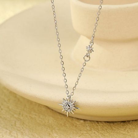 Dainty sunburst pendant necklace in 925 sterling silver.