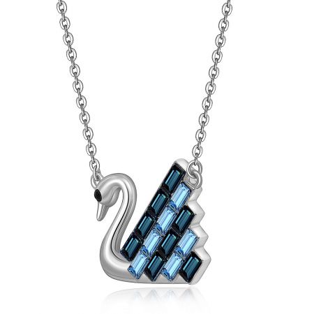 Detailed shot of the sterling silver swan pendant with blue Swarovski crystals, showing the craftsmanship and elegant design.