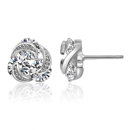 Detailed view of the silver CZ knot stud earrings, showing the front and back construction.
