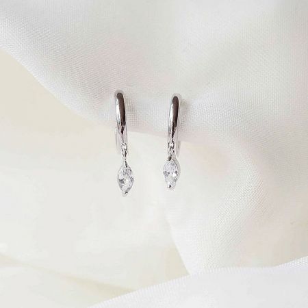The sterling silver version of the shimmering white CZ drop earrings, highlighting their brilliant shine.