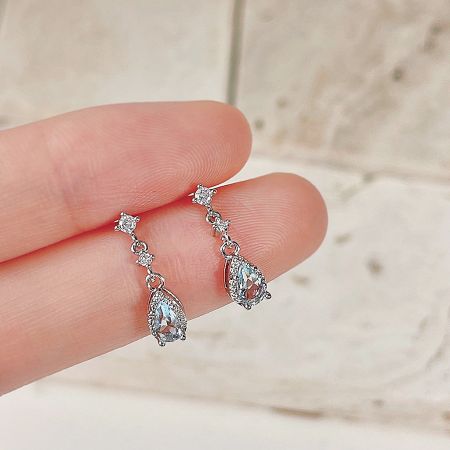 Silver Plated Zircon Blue Waterdrop Drop Earrings (5 pairs) - A close-up of the Silver Plated Zircon Blue Waterdrop Drop Earrings, showcasing the intricate design with a large teardrop gemstone surrounded by smaller clear stones.