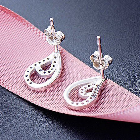 Intricate silverwork detail on the water drop stud earrings, showcasing quality craftsmanship.