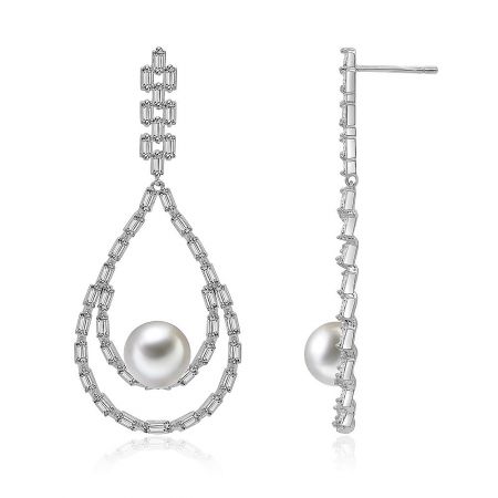 Side profile of the silver teardrop pearl earrings, detailing the post closure and the arrangement of baguette-cut gemstones.