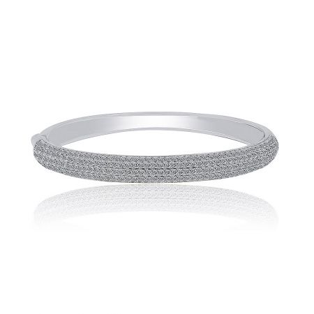 Detailed shot of the cubic zirconia pave setting on the rhodium-plated bangle.