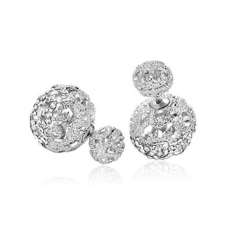 A close-up view of the pave setting on the Double Ball earrings, showing the intricate texture and craftsmanship.