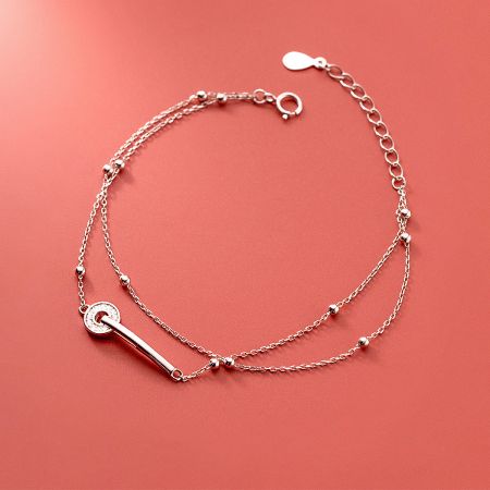 Wholesale 925 Sterling Silver Double-Layer Circle Bead Chain Bracelets (Set of 5) - A close-up of a wholesale 925 sterling silver double-strand bead chain bracelet, featuring an elegant toggle clasp.