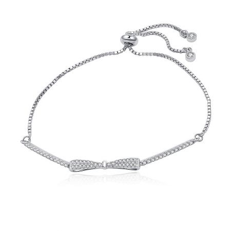 Sterling Silver Pave Bow Bolo Bracelet - A close-up of the Sterling Silver Pave Bow Bolo Bracelet, showcasing the intricate bow design adorned with sparkling cubic zirconia stones and its adjustable sliding clasp on a clean white background.