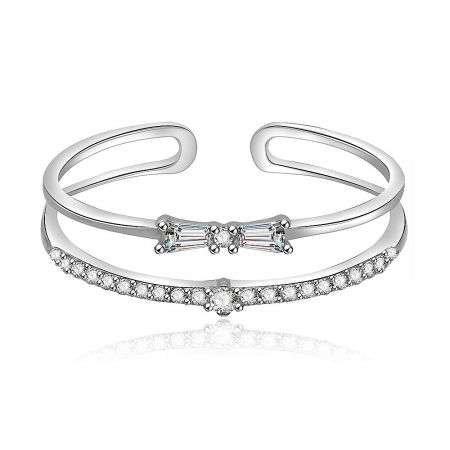 Tiny Bow Ring with Cubic Zirconia - A beautifully crafted Tiny Bow Ring in 925 sterling silver, featuring a delicate bow centerpiece adorned with sparkling white cubic zirconia stones.