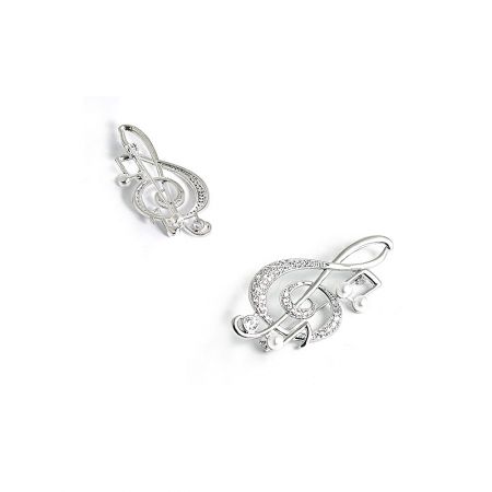 A pair of silver treble clef earrings with diamond accents, showcasing a similar design theme.