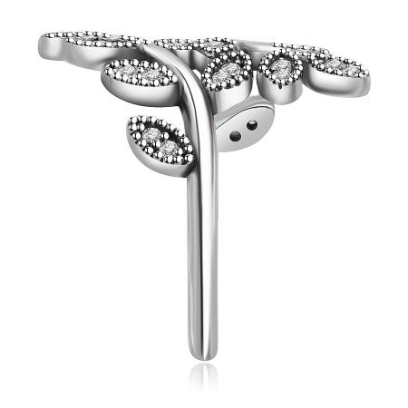 A delicate silver tree-shaped pendant with sparkling gemstones, complementing the Shimmering Leaves ring.