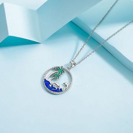A different angle of the tropical-themed silver necklace, highlighting its craftsmanship.