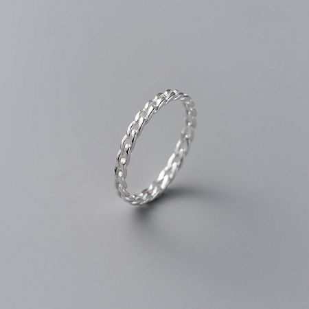 A sterling silver ring featuring an intricate twisted rope pattern, perfect for stacking.