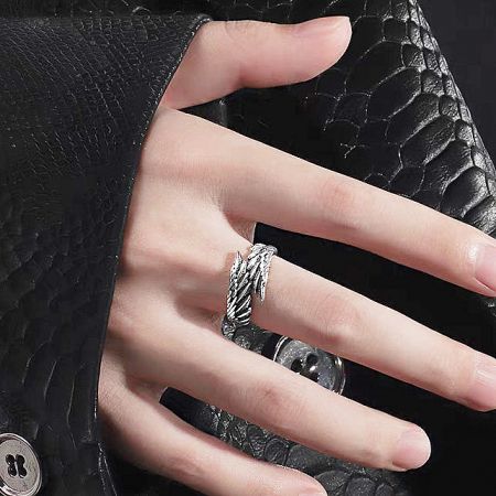 A detailed view of the twisted rope design sterling silver ring from the set.