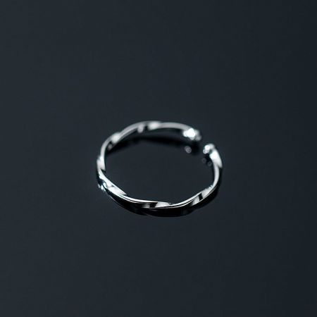 Close-up view of the 925 sterling silver twist ring, highlighting its polished finish and design.