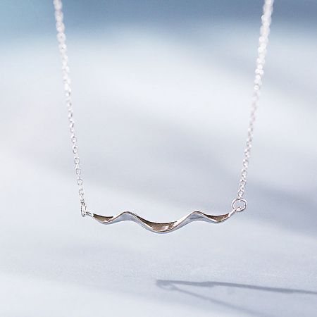 925 Sterling Silver Simple Coastline Wave Necklace Set of 5 - A close-up of the 925 Sterling Silver Simple Coastline Wave Necklace, showcasing the detailed and elegant wavy pendant design.