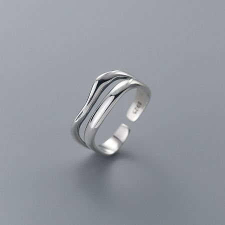 Detailed view of the 925 sterling silver wave ring's fluid, double-layered design.