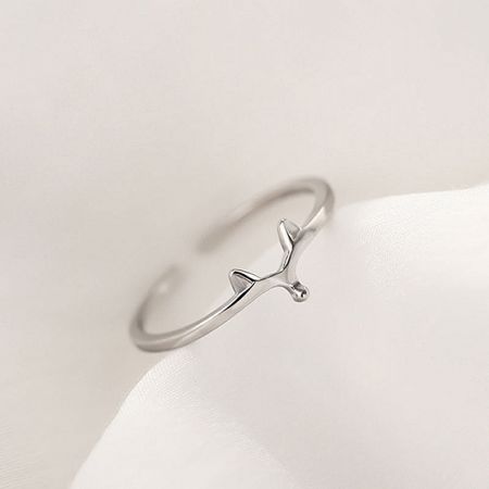 Elegant sterling silver ring with a polished whale tail design.