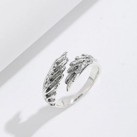 Another perspective of the open-wing design sterling silver ring.