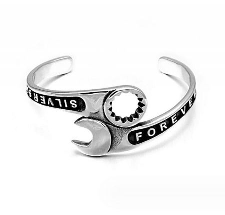 Tool Bangle Bracelet For Men - Close-up of the Tool Bangle Bracelet for Men, crafted from stainless steel with a unique wrench and gear design.