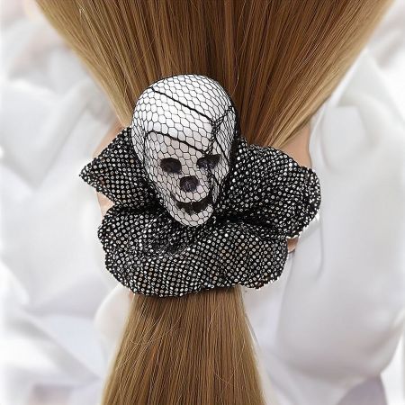 The skull hair accessory displayed to show its full punk aesthetic.
