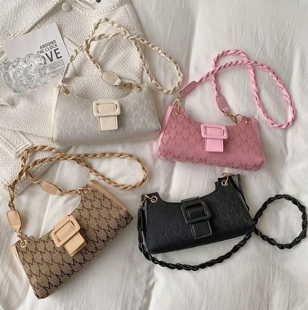 A collection of the Girly Shoulder Handbag available in multiple colors, highlighting customization options.