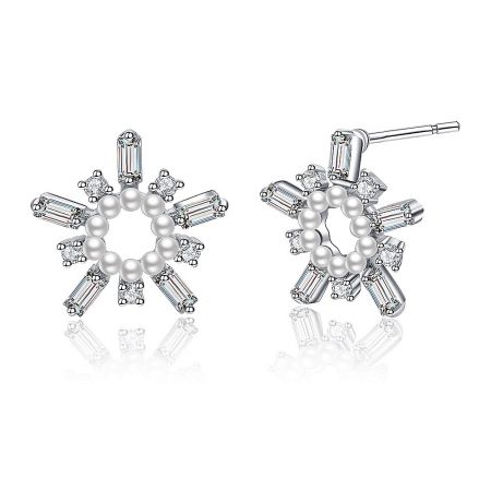 Detailed view of a single White As Snow Pearl Earring, highlighting the central pearl and surrounding cubic zirconia.