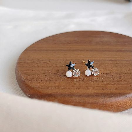 Gold Plated Small Zircon Black Star Stud Earrings (5 Pairs Set) - A set of gold-plated stud earrings featuring black star designs with sparkling zircon, pearl, and crystal accents, presented on a white background.