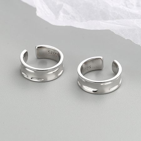Two S925 sterling silver ear cuffs displayed together, showcasing their minimalist and unisex appeal.