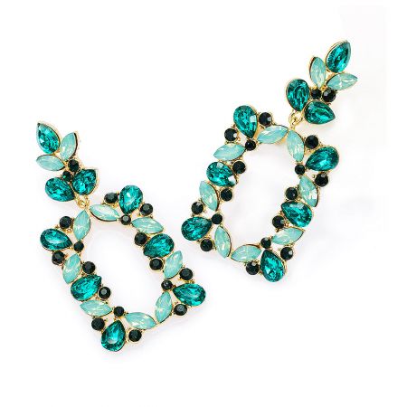 Side angle of the gold-toned Large Green Tone Earrings, highlighting the floral pattern with teal and black crystals.