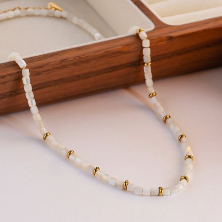 Close-up of the necklace's high-quality stainless steel clasp and extender chain.