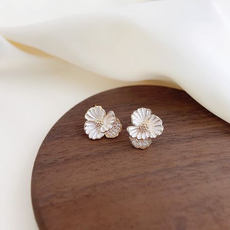 14k Gold Plated White Enamel with Zircon Flower Stud Earrings (5 Pairs) - A pair of 14k gold plated flower stud earrings with white enamel petals and a central zircon stone on a white background.