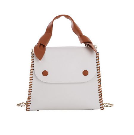 Cream PU Leather Lady Handbag - Front view of the stylish cream PU leather lady handbag with distinctive brown accents and elegant gold hardware, model JRP-043.