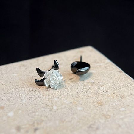 Handmade Resin & Enamel Rose Flower Asymmetrical Stud Earrings (5-Pair Set) - A pair of handmade asymmetrical stud earrings, one featuring a white resin rose on a black base and the other a simple black stud, showcasing the unique floral design.